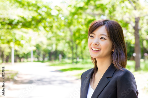 asian businesswoman in the park