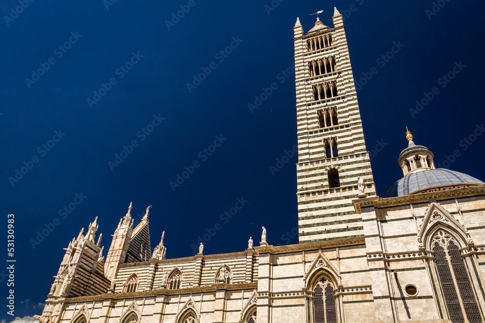 Cathedral in Siena on a blue sky background