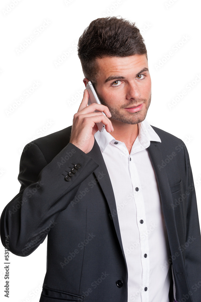 Young business man with open collar talks on mobile phone Young business man with open collar talks on mobile phone