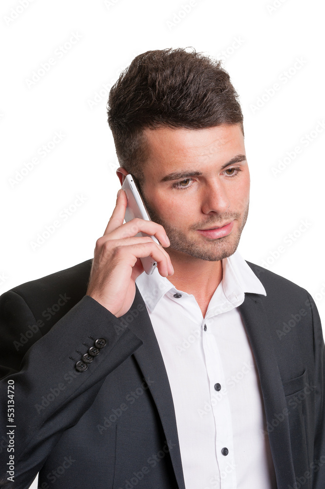 Young business man with open collar talks on mobile phone Young business man with open collar talks on mobile phone