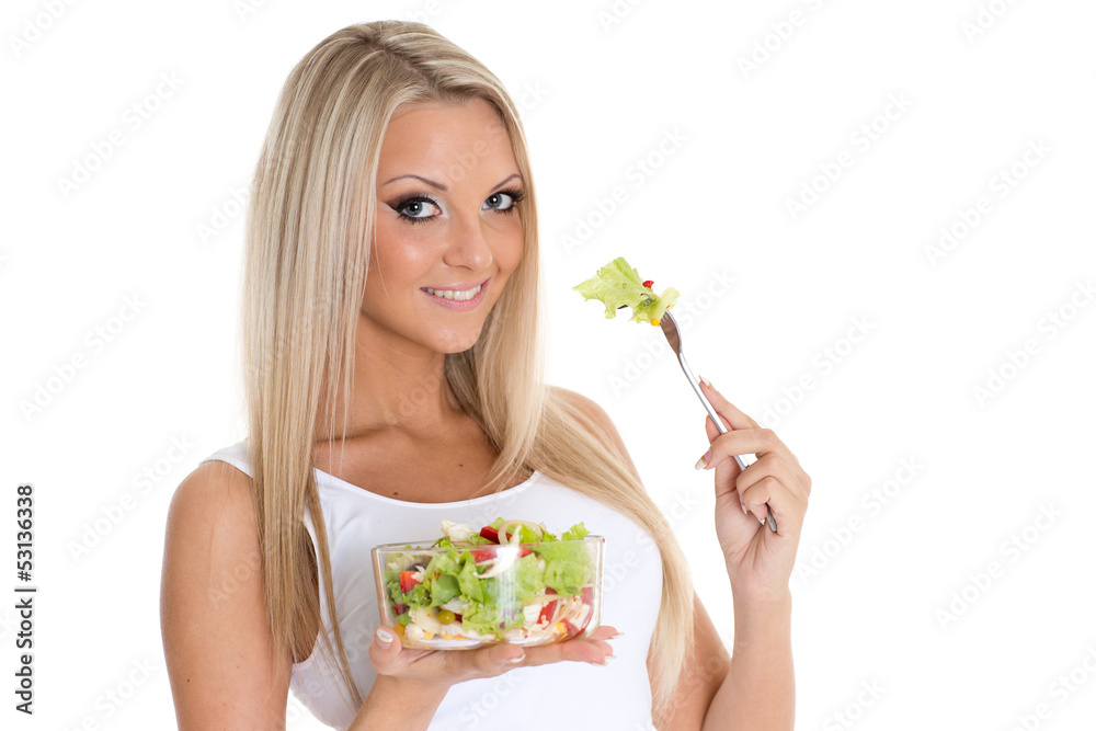 Slender woman holds a bowl of salad. Slender woman holds a bowl of salad.