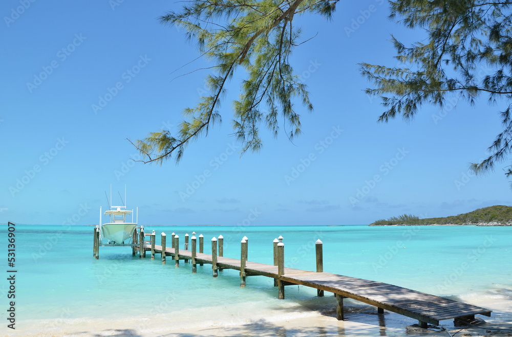 Fototapeta premium Yacht at the wooden jetty. Exuma, Bahamas