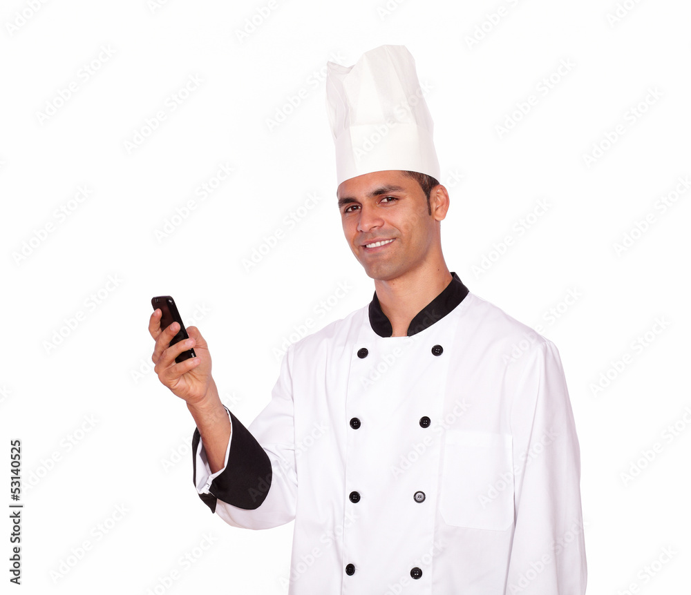 Charming men in chef uniform texting on cellphone Charming men in chef uniform texting on cellphone
