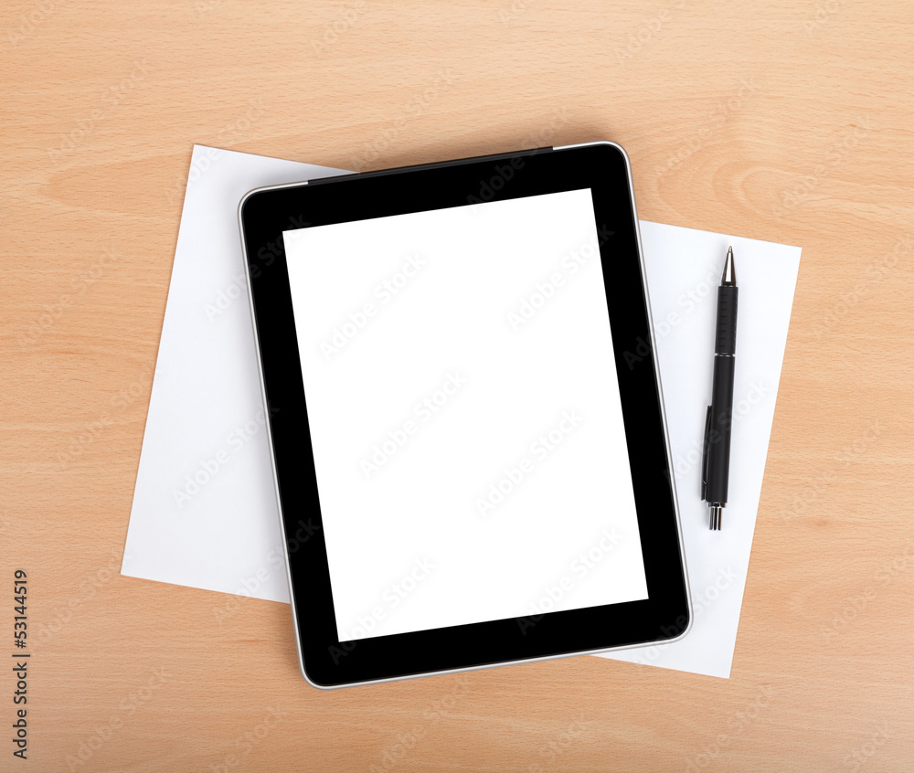 Tablet with blank screen over white papers Tablet with blank screen over white papers