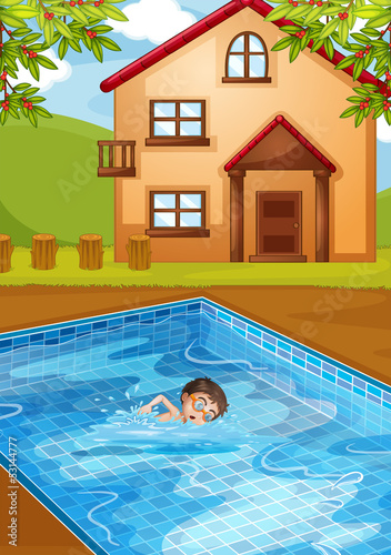 A kid swimming at the pool