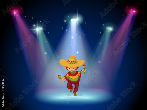 A stage with a young girl dancing in the middle