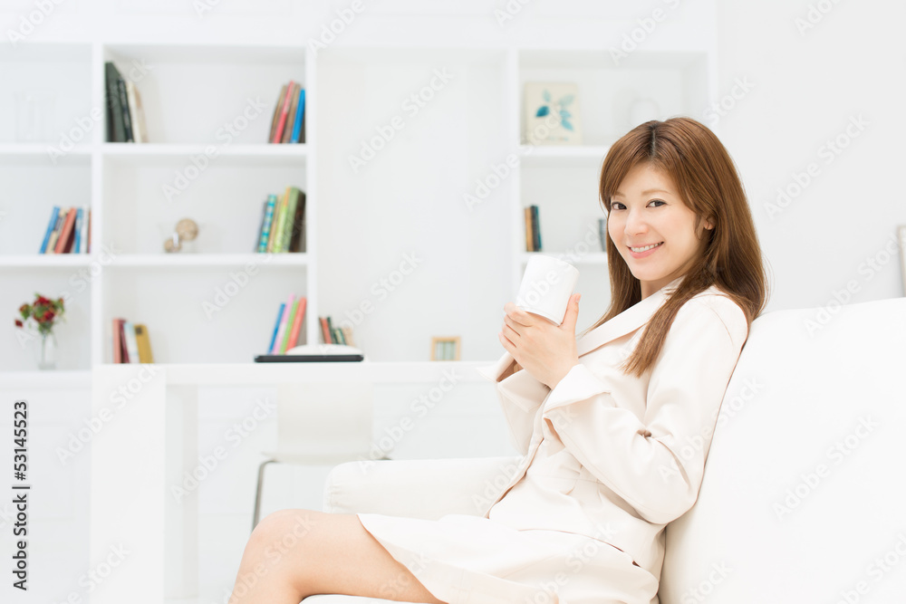 Beautiful young businesswoman working in office Beautiful young businesswoman working in office