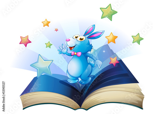 A book with a bunny surrounded with stars