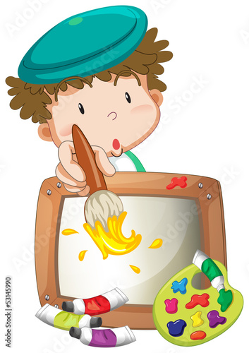 A little boy painting
