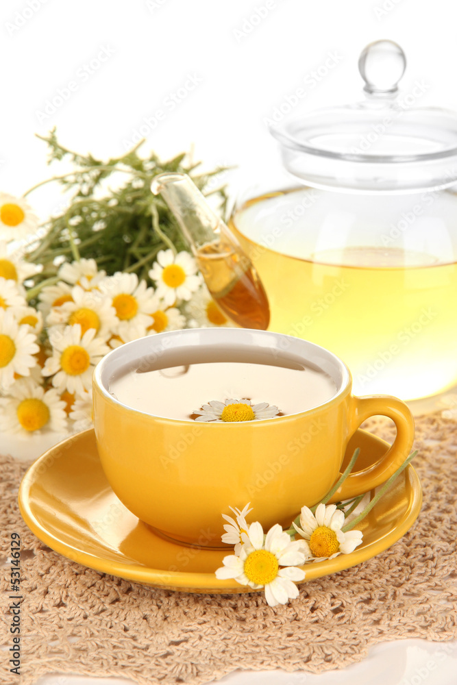 Cup of herbal tea with camomiles close up Cup of herbal tea with camomiles close up