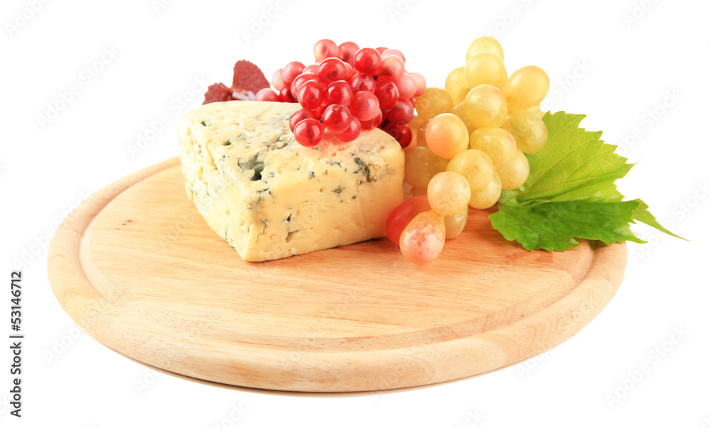 Tasty blue cheese and grape on cutting board, isolated on white Tasty blue cheese and grape on cutting board, isolated on white