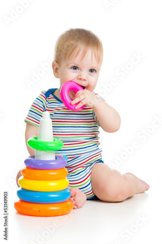 child playing with colorful...
