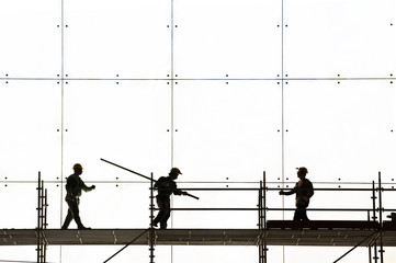 Construction worker silhouette at work