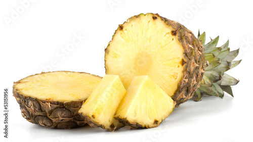 Juicy pineapple with slices isolated on white background