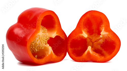 Cut sweet red peppers isolated on white