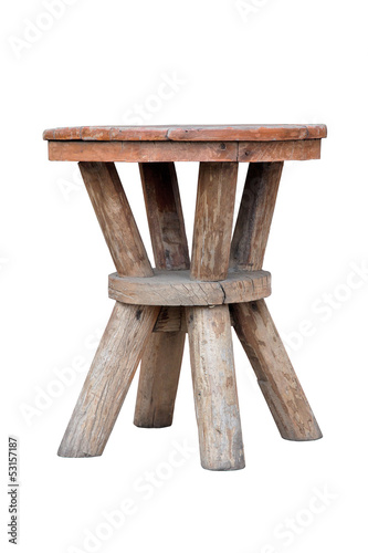 Old wooden stool isolated on white background photo