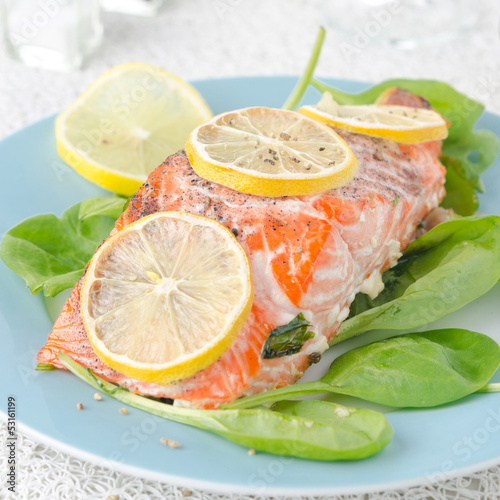 Baked salmon fillet with lemon and spinach