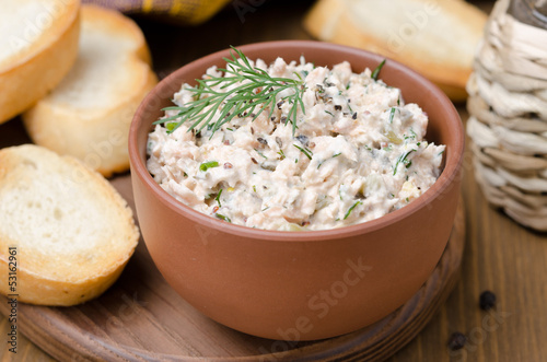 pate of smoked fish with sour cream and herbs, close-up