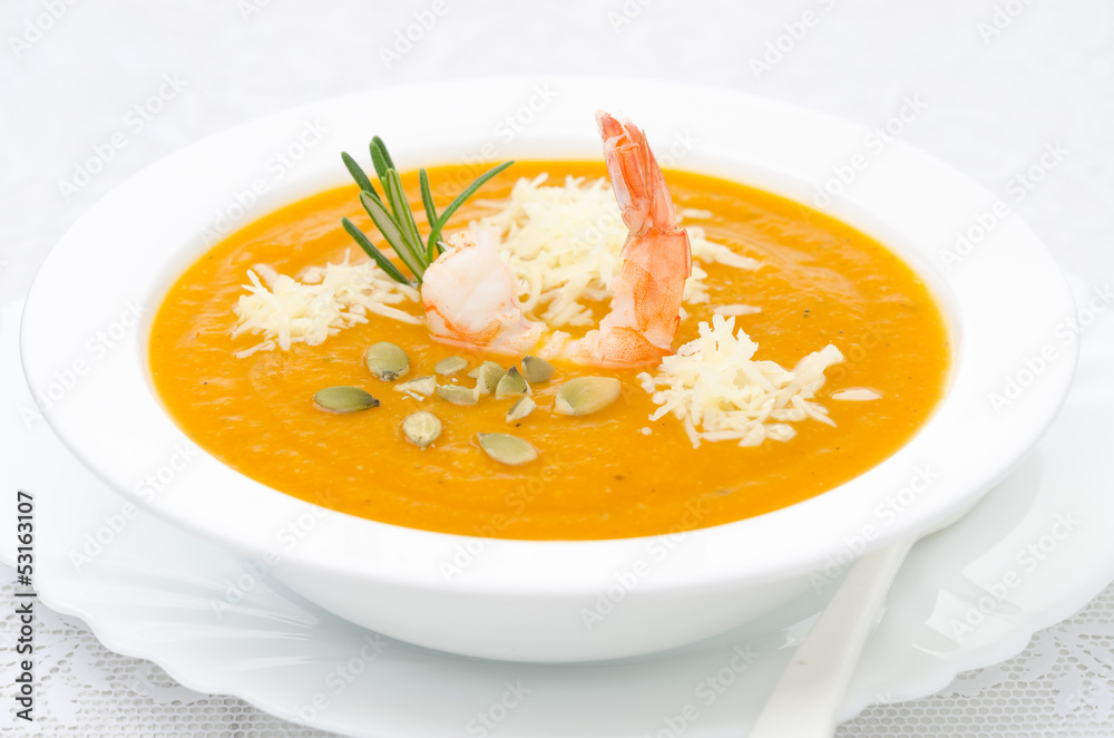 pumpkin soup with shrimp, Parmesan and rosemary horizontal pumpkin soup with shrimp, Parmesan and rosemary horizontal