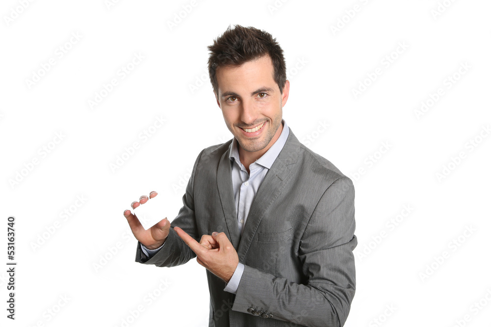 Successful businessman showing business card Successful businessman showing business card