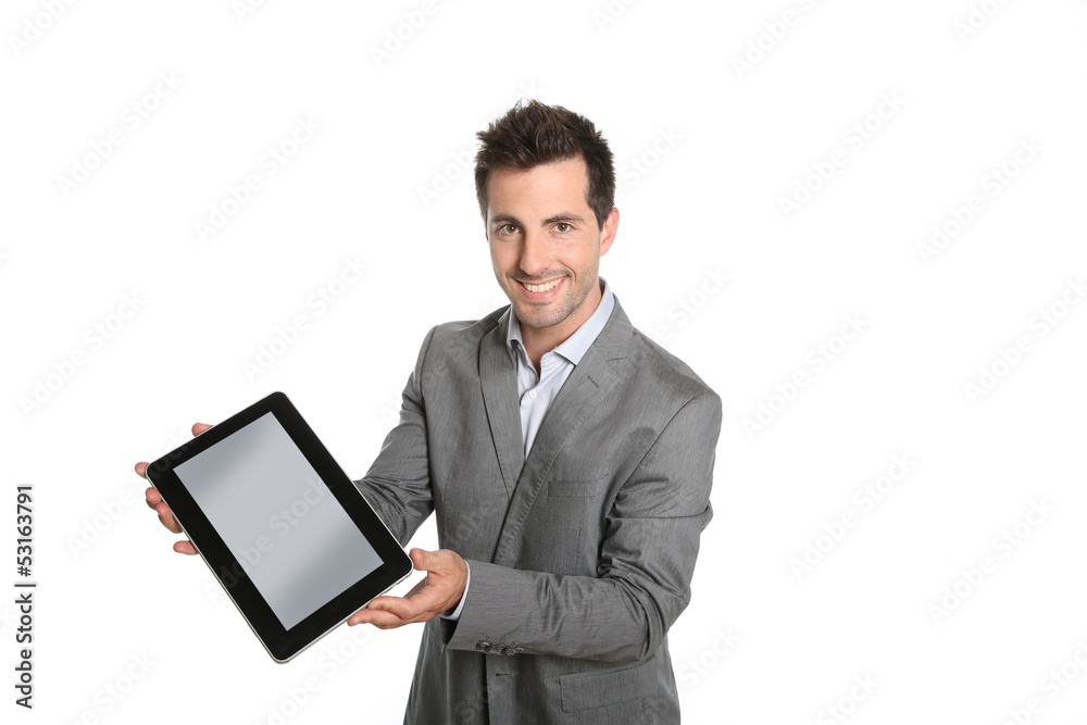 Smiling businessman presenting website on tablet Smiling businessman presenting website on tablet
