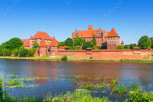 Malbork castle in summer scenery, Poland