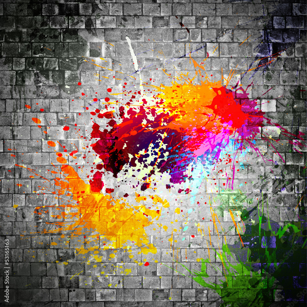 Naklejka premium ink splatter on stone wall