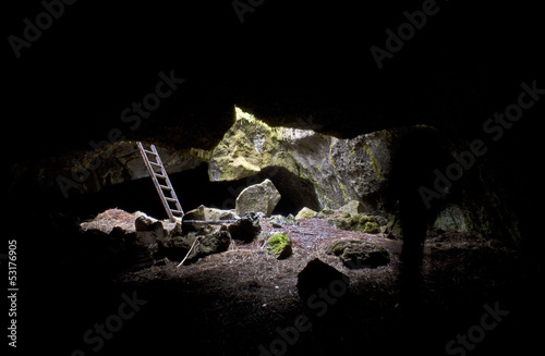 Ladder access for lava tube cave viewed from inside