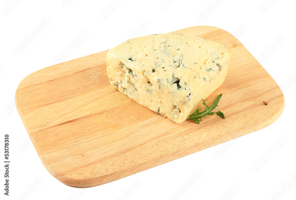 Tasty blue cheese on cutting board, isolated on white