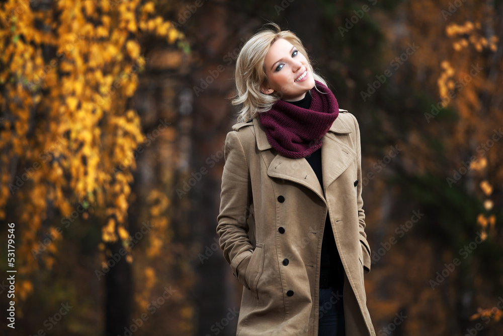 Young blond woman in autumn forest Young blond woman in autumn forest