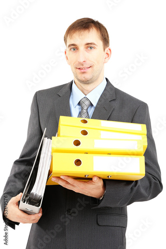 Young businessman with fold...