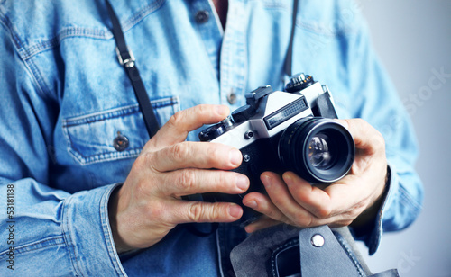 Image of reporter with film camera