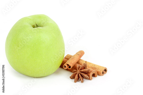 green apple and spices isolated on a white background