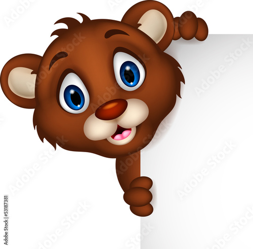 cute baby brown bear cartoon posing with blank sign