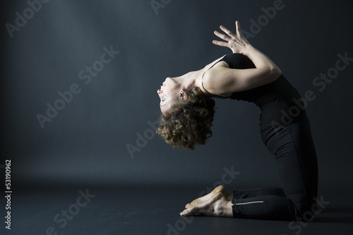yoga posture backbanding pose with anjeli mudra side view
