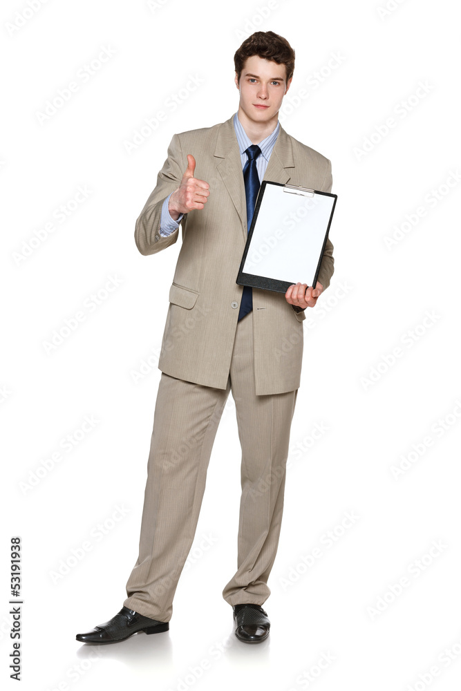 Businessman holding blank whiteboard showing thumb up gesture Businessman holding blank whiteboard showing thumb up gesture