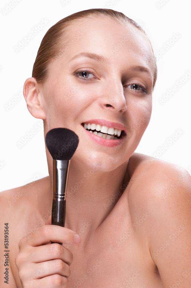 Woman with makeup brush isolated Woman with makeup brush isolated