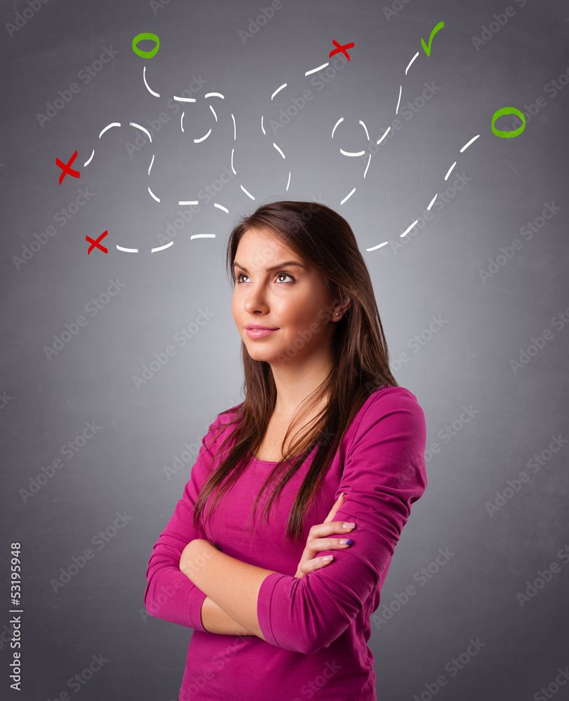 Young woman thinking with abstract marks overhead Young woman thinking with abstract marks overhead