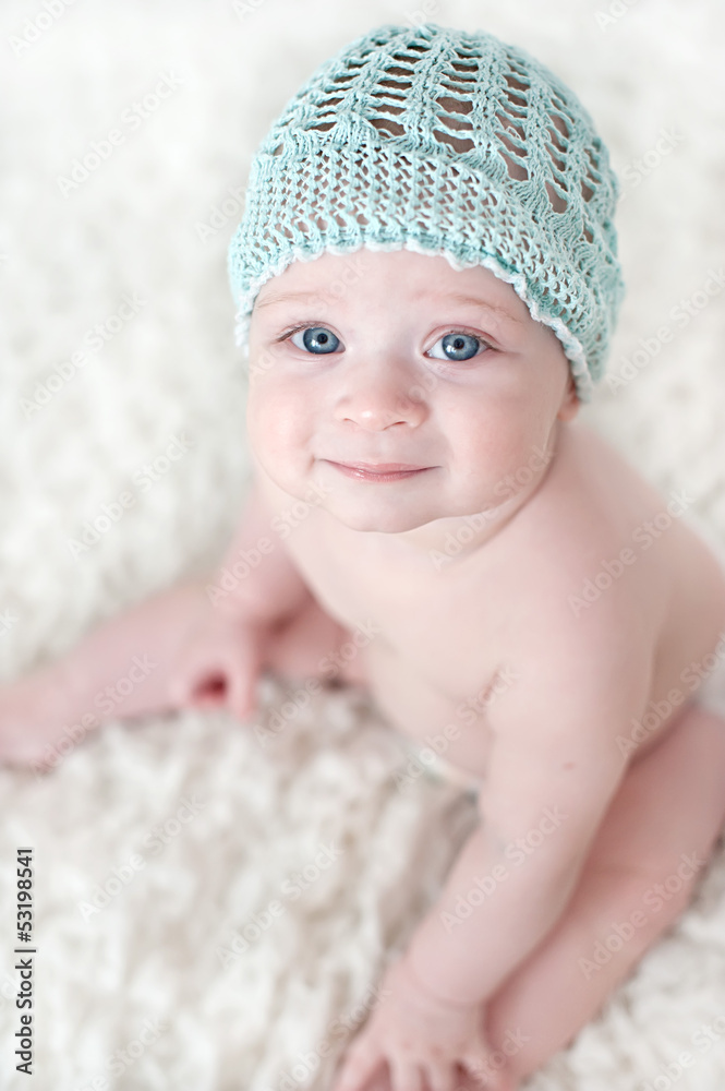 Little beautiful blue-eyed baby