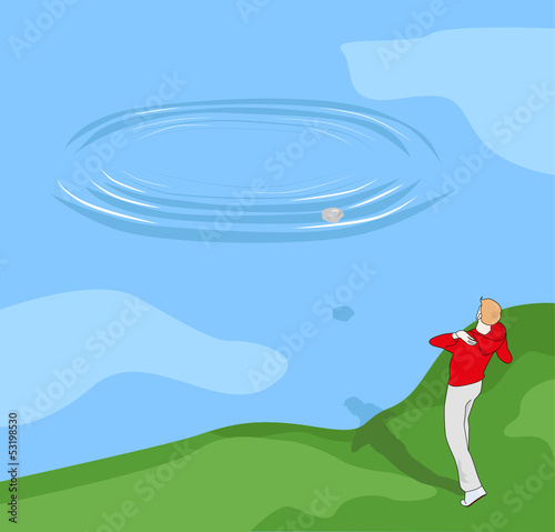 Boy throwing stones into the water