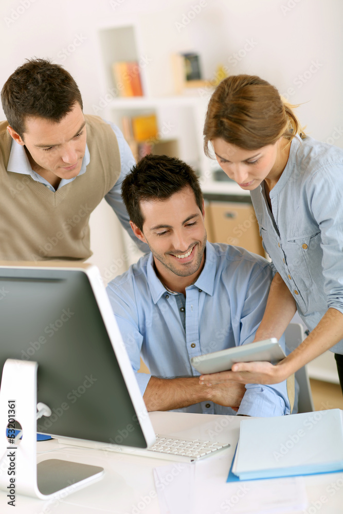 Fototapeta premium Office workers using tablet and computer