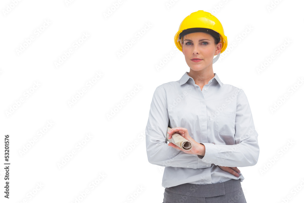 Architect with yellow helmet and rolled up plan Architect with yellow helmet and rolled up plan