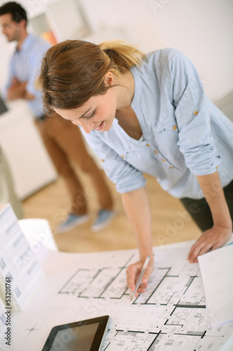 Wallpaper Mural Young woman architect working in office Torontodigital.ca