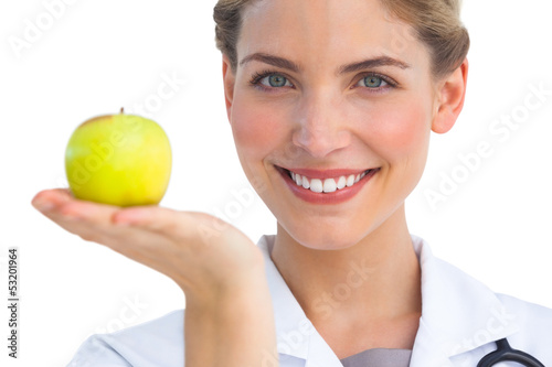 Nurse with apple in her hand