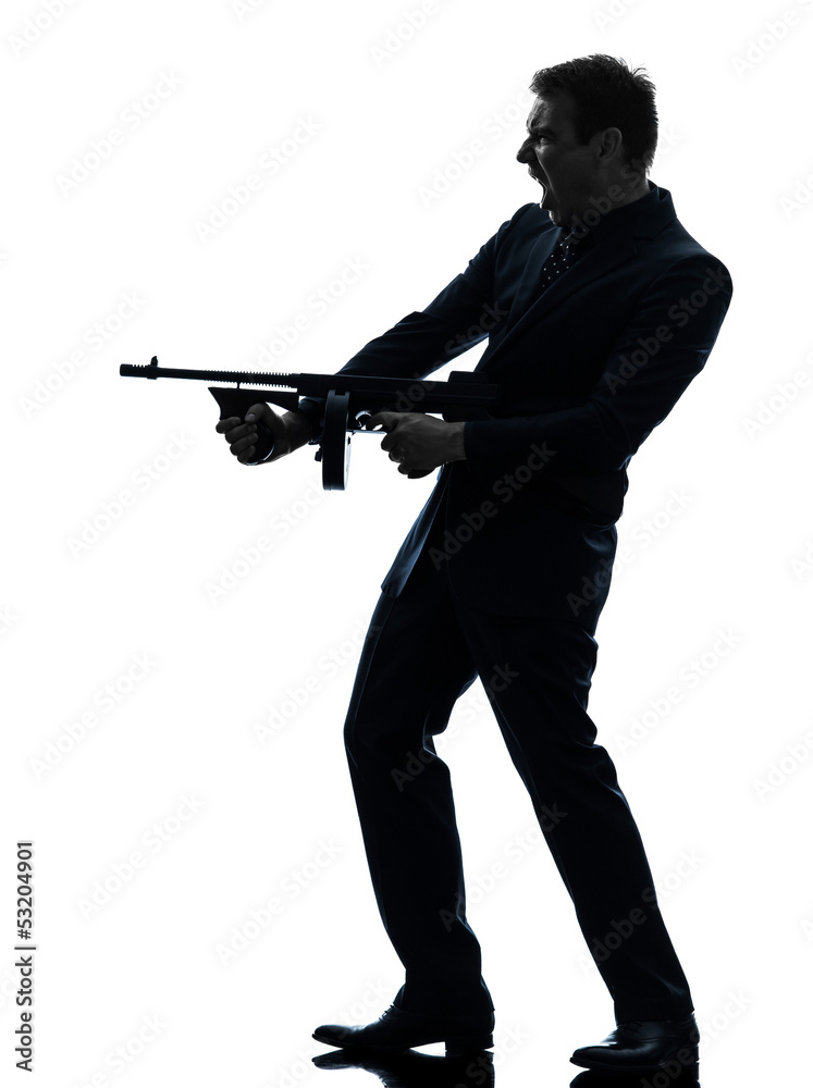 gangster man holding thompson machine gun silhouette gangster man holding thompson machine gun silhouette