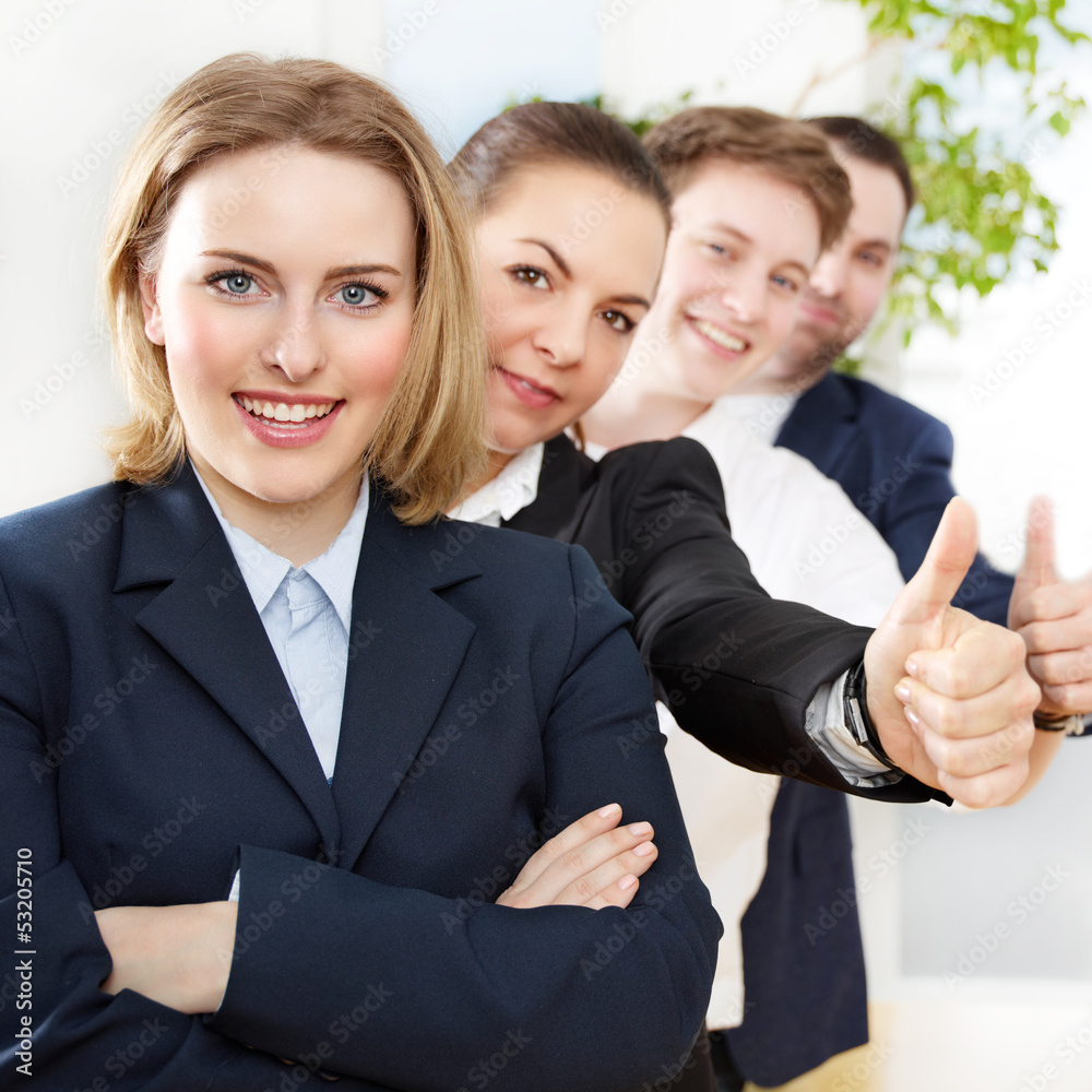 Successful business people are in line, show thumbs up Successful business people are in line, show thumbs up