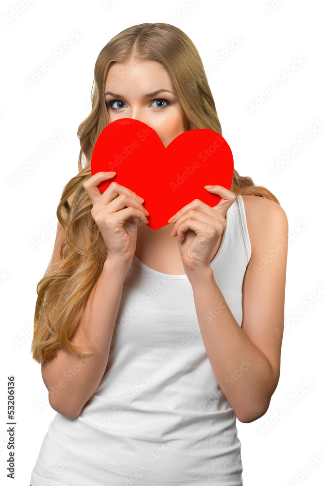 Young beautiful female peeking from the heart shape Young beautiful female peeking from the heart shape