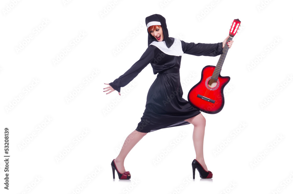 Nun playing guitar isolated on white