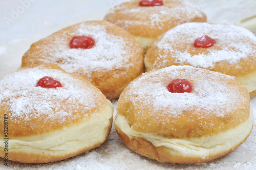 Hanukkah sufganiya, doughnut with jam and caster suga