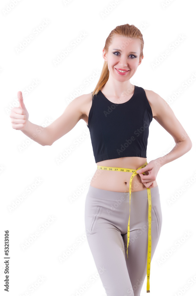 Young girl with centimeter in dieting concept Young girl with centimeter in dieting concept